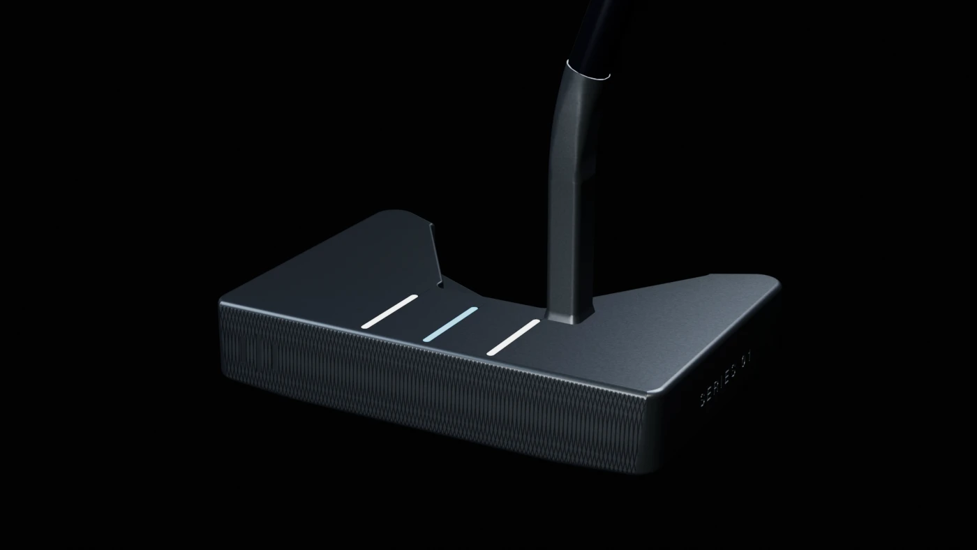 Black anodized STILL mallet putter head viewed from above and behind